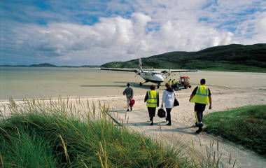 Plane At Traigh Mhor, Barra Credit Visitscotland