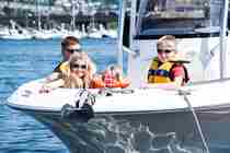 YHQ Family On Bow Motorboat
