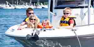 YHQ Family On Bow Motorboat