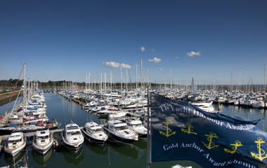 Lymington View From Office With Gold Anchor Flag